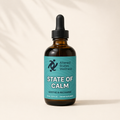 Bottle of 'State of Calm' by Altered States Wellness on a beige background