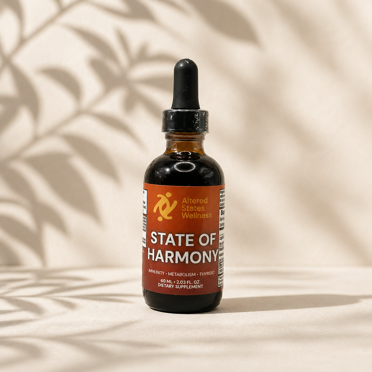 Bottle of 'State of Harmony' supplement with a dropper on a beige background